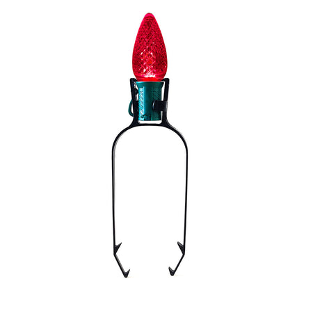 Red Christmas light bulb on a white background